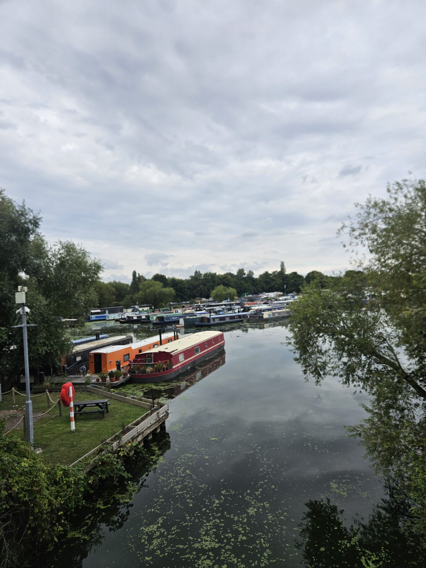 View of canal boats and barges on the water 